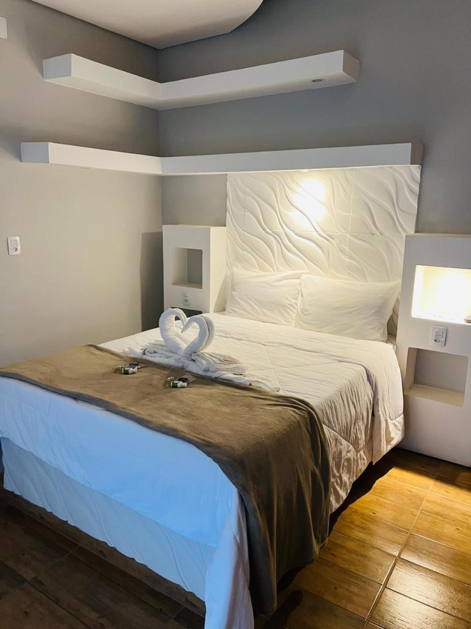 Quarto com Cama Queen-Size e Varanda